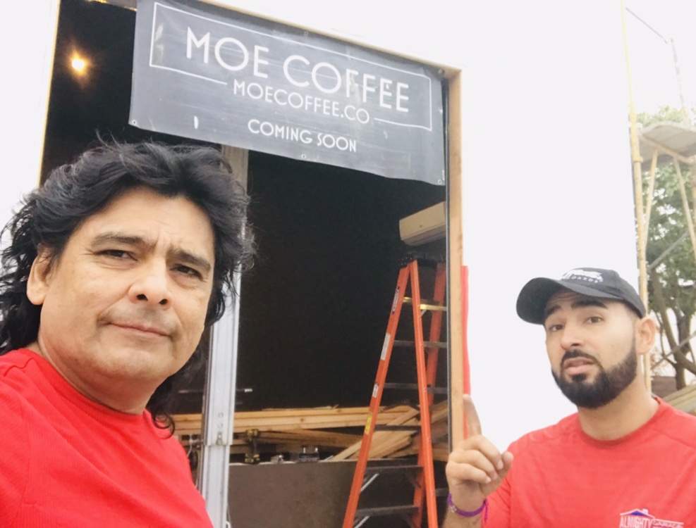 Almighty crew at a storefront door job